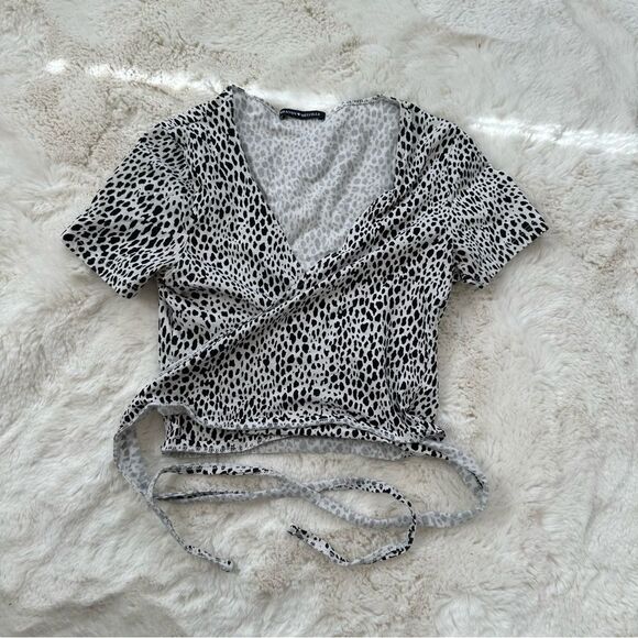 Brandy Melville Tops - brandy melville white and black spotted cross over tie top